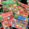 Girl and Gifts Christmas Gold Foil Stickers