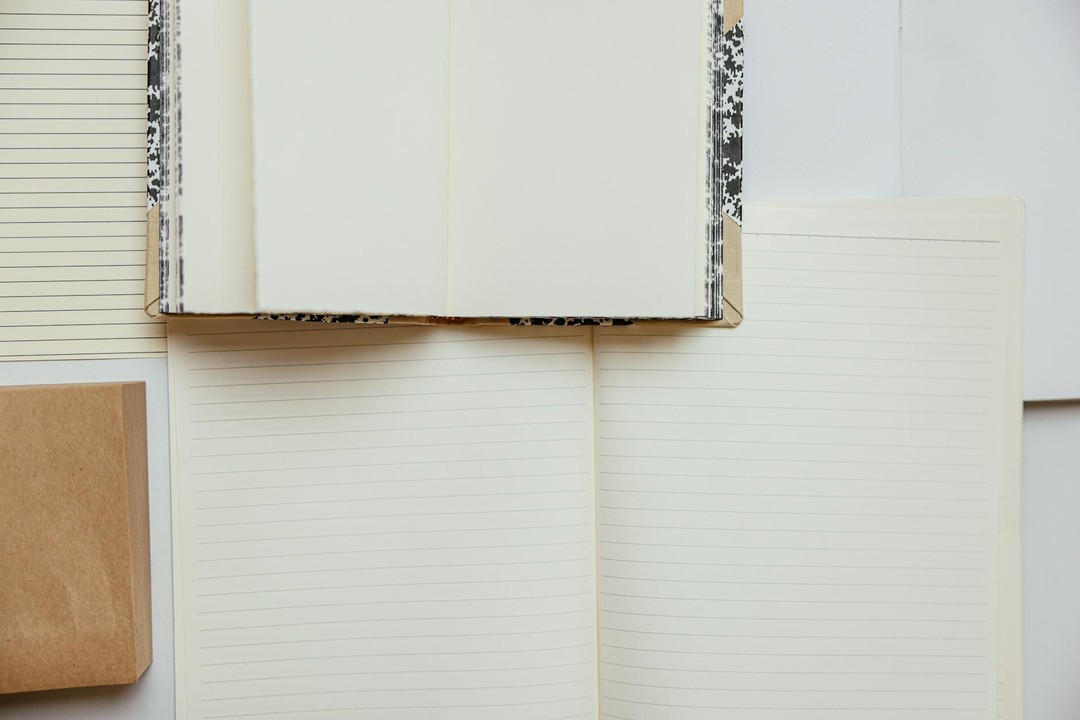 What Materials Work Best with a Custom Embosser? A Practical Guide Stationery flatlay with embossed paper and craft materials